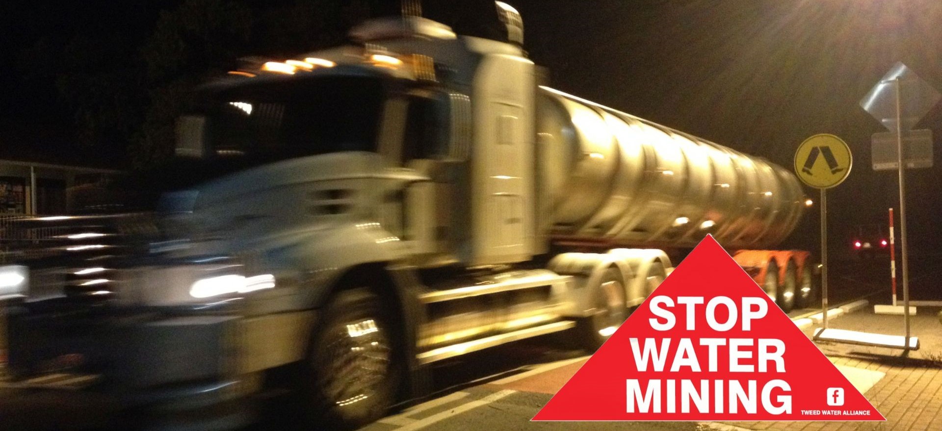 Tanker running through a crossing at night
